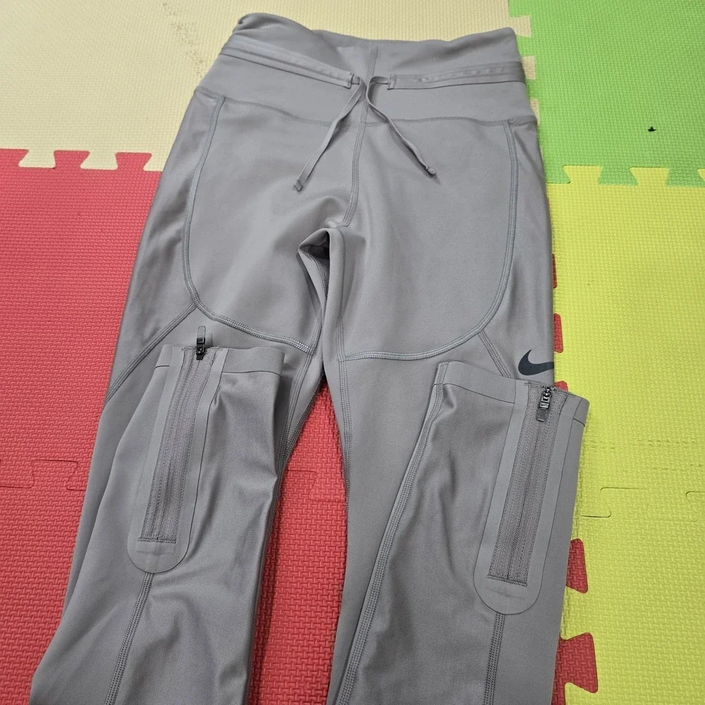 Nike Women's S Dri-FIT‎ Running Leggings Beige Gray Zipper Pockets Ankle Zip